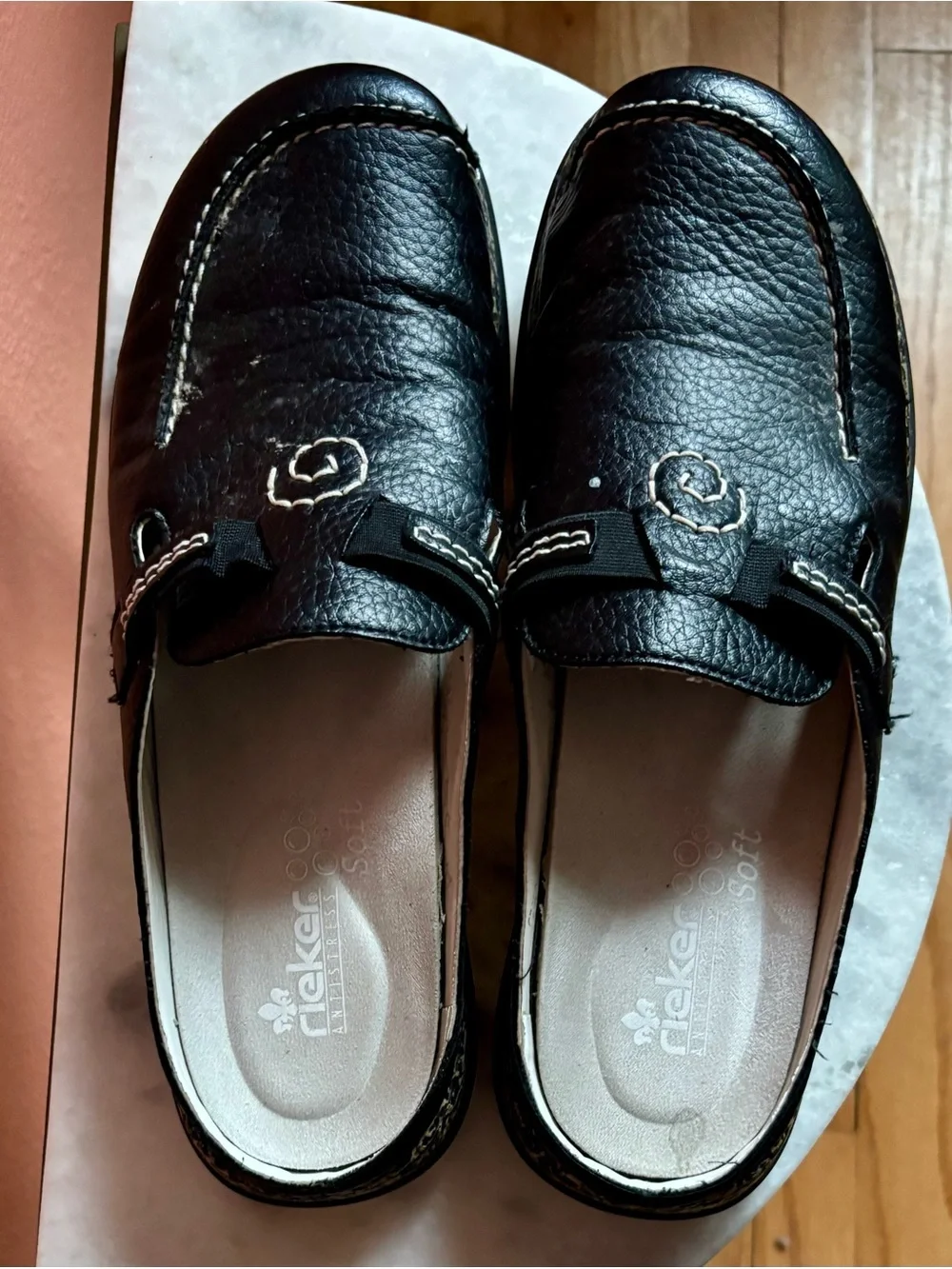 Rieker Black Slip-On Mule Loafers with Patterned Midsole